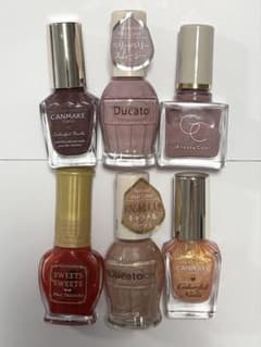 Set of 6 nail polishes in pink, beige, and red