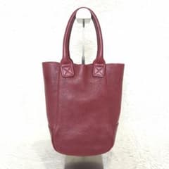 美品】ゲンテン・ハンドバッグ・シボ革・筒型・縦長 - メルカリ
