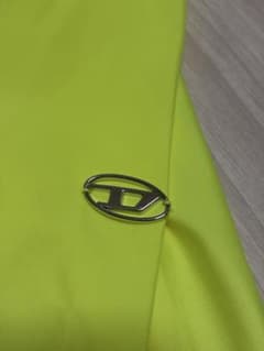DIESEL レディース トップス 長袖 タートルネック ネオンカラー