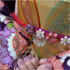 お花の飾り付き帯絞めのサムネイル