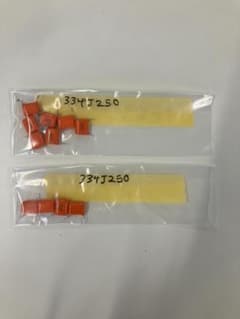 【電子工作部品】番号165　フィルムコンデンサ(オレンジ)のサムネイル