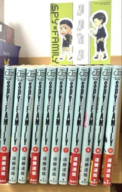 SPY×FAMILY Volumes 1-11 with bonus stickers. By Tatsuya Endo. Published by JUMP and Shueisha.