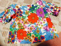 花柄オフショルトップスのサムネイル