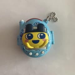 カプセルトイ 笑顔のキャラクター付きのサムネイル