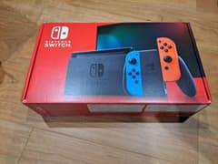ほぼ未使用品 Nintendo Switch 本体 青/オレンジJoy-Con付のサムネイル