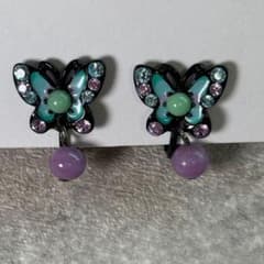 Anna Sui butterfly rhinestone earrings.