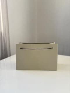 AMAN ベージュ 紙袋のサムネイル