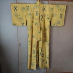 正絹　絣　単衣着物 山吹色に青の絣模様のサムネイル