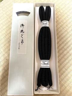 黒いストライプ模様の帯締め