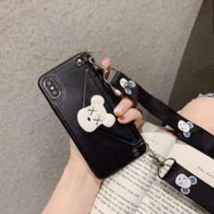 iPhone XR KAWS ブラック ストラップ ケース  おしゃれ 可愛いのサムネイル