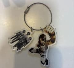 Attack Titan Comes with a bonus Eren acrylic keychain.