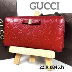 グッチ 極美品！ 長財布 GG柄エンボス シマレザー リボン ラウンド