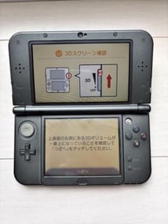 New Nintendo 3DS LL メタリックブラック 本体 ＆ 純正充電器のサムネイル