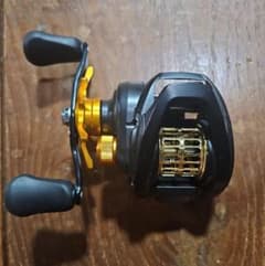Daiwa PR100 ベイトリール 本体+純正パーツ+箱、取り扱い説明書のサムネイル