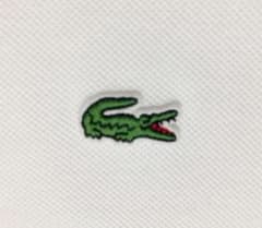 ☺︎新品未使用☺︎ ラコステ　LACOSTE 定番白ポロシャツ　レディース34サイズのサムネイル