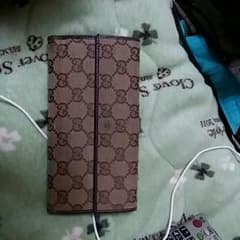 正規品ＧＵＣＣＩの2つ折り長財布のサムネイル