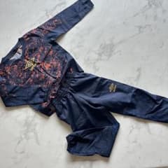 umbro ピステ上下 黒/オレンジ　キッズ130のサムネイル