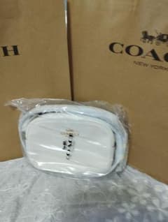 カメラバッグ、白、ショルダーバック、コーチ、斜め掛け