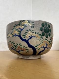 Meiji-era Ninsei tea bowl, antique art piece, collectible, Edo period celadon.