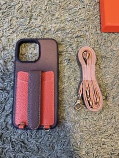 【新品未使用】COGURE iPhone16ProMax 本革ケース オレンジのサムネイル