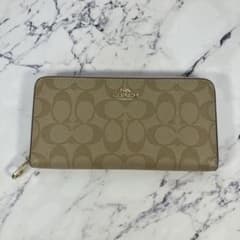 COACHストラップ付長財布ディズニーキースヘリング.コラボUFOプリント