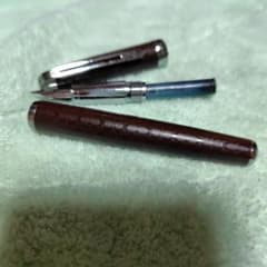 COACH 万年筆 ブラウン シグネチャー柄のサムネイル