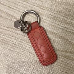 BOTTEGA VENETA オレンジレザーキーホルダー イントレチャート - メルカリ