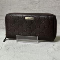 GUCCI 長財布 ラウンドファスナー ダークブラウン メタルロゴ GG 