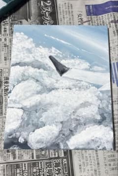 雲海と飛行機の翼を描いた手描きアート作品のサムネイル
