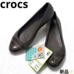 Brand new Crocs cap-toe flat sandals/shoes.