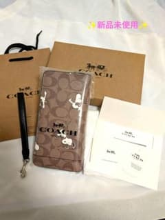 新品未使用】COACH スヌーピー コラボ長財布ストラップ付限定品 - メルカリ