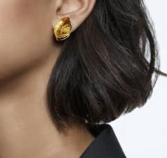 スワロフスキー lucent イエロー ピアス両耳 Swarovski - メルカリ
