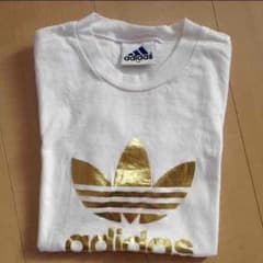 Mimi様専用☆adidasのゴールドロゴTシャツのサムネイル