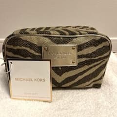 【新品】MICHAEL KORS ゼブラ柄 コスメポーチのサムネイル