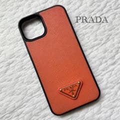 美品✨プラダ 三角ロゴプレート サフィアーノ iPhone13ケース オレンジ 美品✨プラダ 三角ロゴプレート サフィアーノ iPhone13ケース