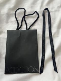 ADDICTION ショップ袋 紙袋 リボン付きのサムネイル