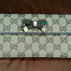 早い者勝ち！GUCCIリボン長財布のサムネイル
