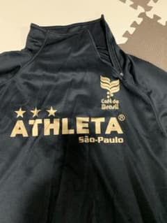 ATHLETA ピステ・ウィンドブレーカー M ゴールド/ブラック ATHLETA ピステ 長袖 ブラック ゴールド - メルカリ