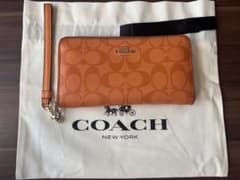 COACH シグネチャー 長財布 リストレット付き 巾着 紙袋付き - メルカリ