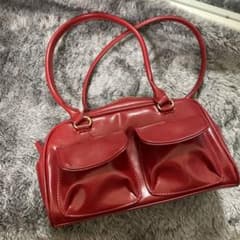 赤のポケット付きハンドバッグのサムネイル