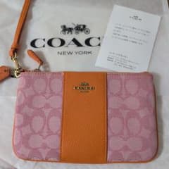 COACH シグネチャー リストレット ポーチ ピンク オレンジのサムネイル
