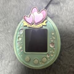 たまごっちピース グリーン 激レアたまデコピアス　ラブメロ　ver. 日*4様 たまごっちぴーす Tamagotchi P's ラブメロ グリーン 希 - メルカリ