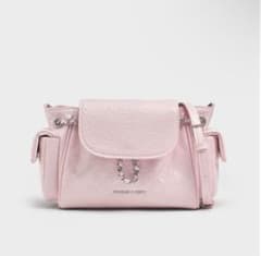CHARLES & KEITH コットンキャンディピンク リュック バッグ - メルカリ