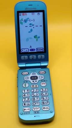 Excellent condition Fujitsu docomo F-01G Raku-Raku Phone (light blue) mobile phone.