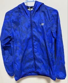 New Balance グラフィックパッカブルジャケット レディースMのサムネイル