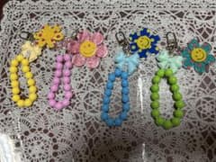 ニコちゃん フラワー キーホルダー ピンク　イエロー　ブルー　ライトグリーンのサムネイル