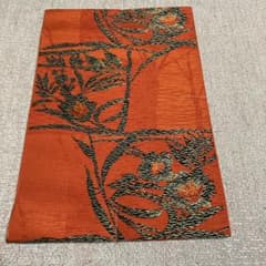【しつけ糸付き】オレンジ系 帯 草花文様 華やかのサムネイル