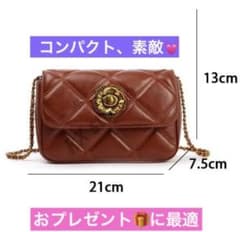 牛革ショルダーバッグ ブラウン コンパクト 小さな金玉デザインの 