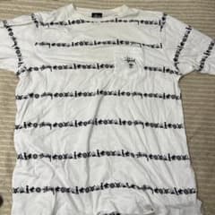 STUSSY ポケットTシャツ 総柄 ホワイトのサムネイル