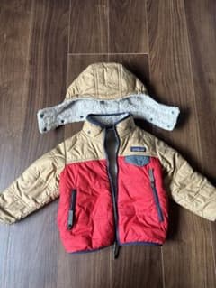 美品 patagonia リバーシブル トリブルズ フーディ赤・ベージュ 2Tのサムネイル